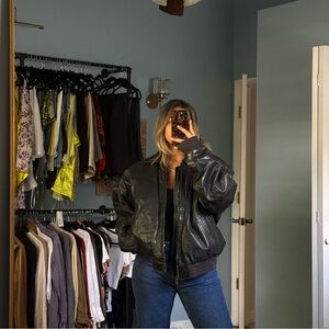 black vintage leather bomber jacket